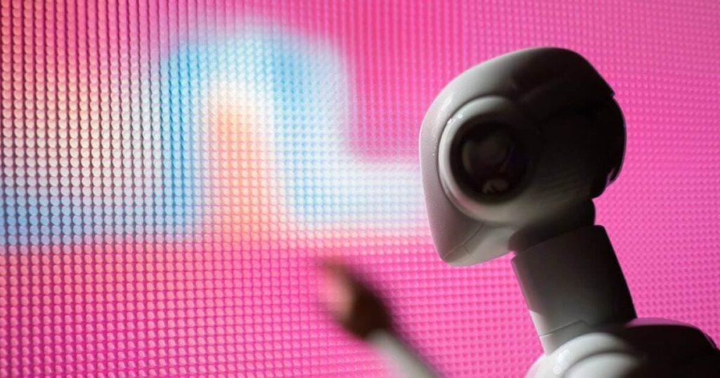 AI-powered interactive holographic avatar at a Sparks-designed healthcare exhibit — personalized, conversational technology surfacing therapeutic-area content on demand.