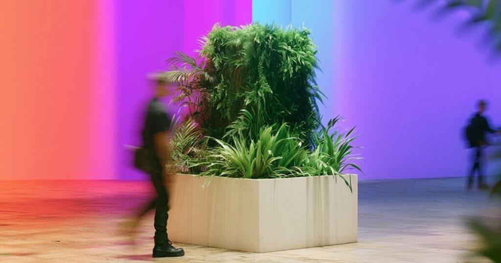 Biophilic design at a Sparks-produced healthcare exhibit — living plants and botanical elements integrated into the booth to reduce stress and increase dwell time.
