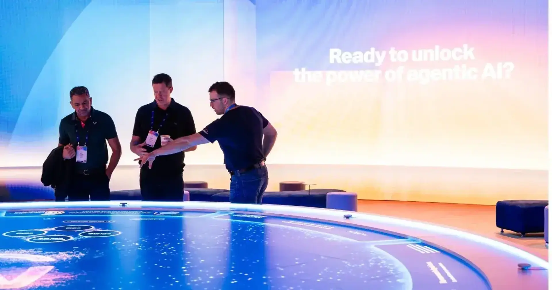 Attendee trying an agentic AI hands-on demo at Workday Rising 2025