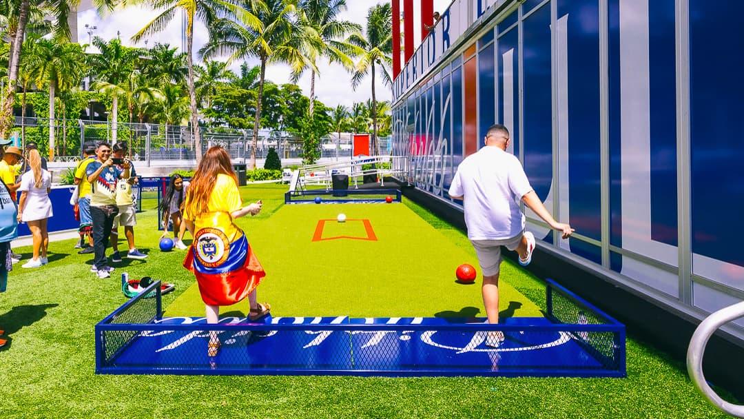 Fans playing Soccer Skee-Ball at the Michelob ULTRA Copa América activation