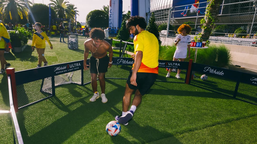 Fan at a 1v1 mini-pitch game in the Michelob ULTRA Beer Garden