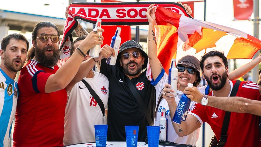 Fans playing Soccer Skee-Ball at the Michelob ULTRA Copa América activation