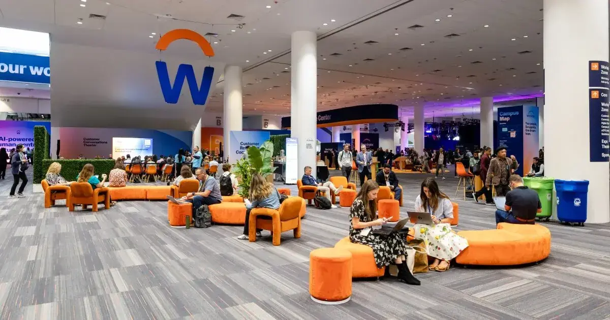 Expo floor lounge and seating area at Workday Rising 2025