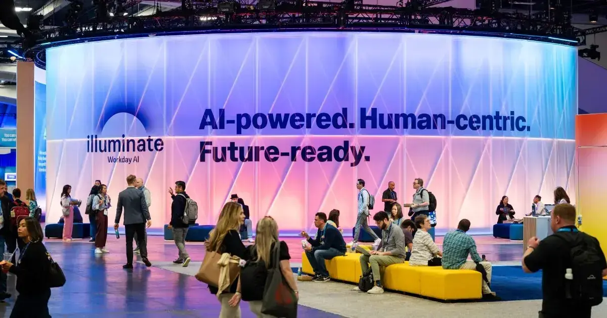 "Illuminate your work day" AI-powered, human-centric theme wall at Workday Rising 2025