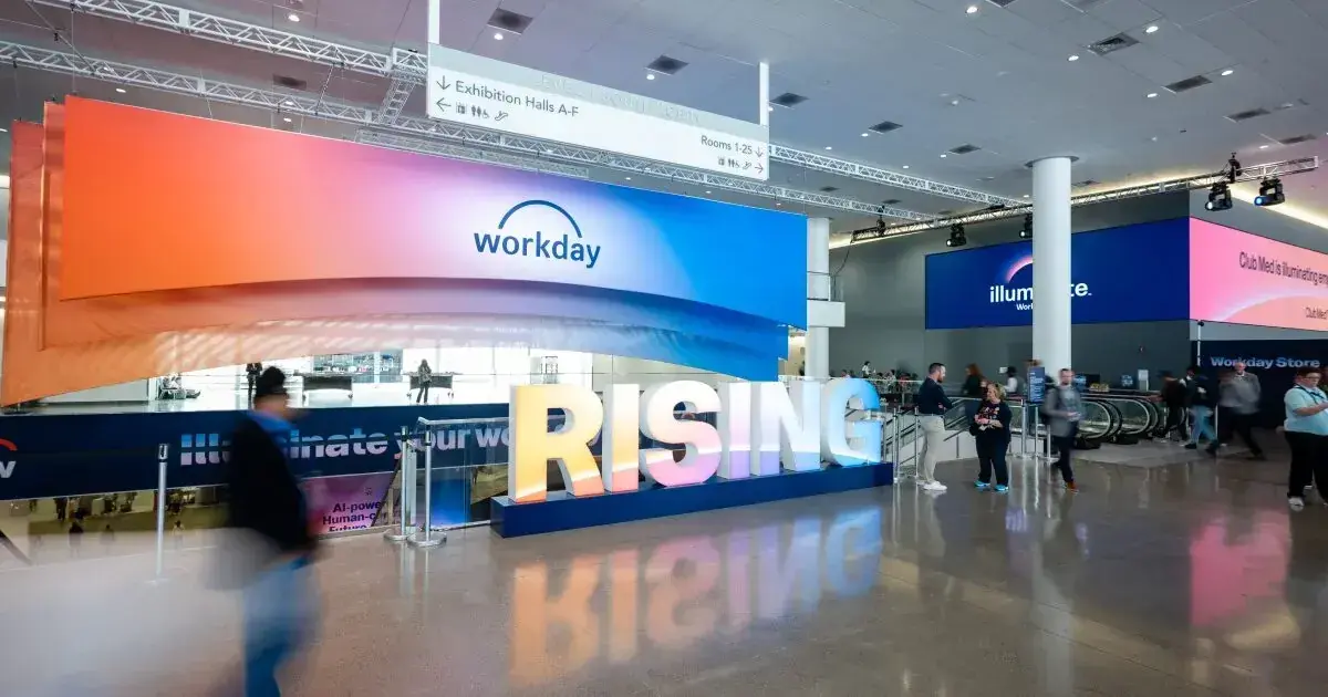 Attendees arriving at Workday Rising 2025 registration at the Moscone Center
