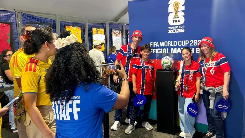 Norway fans pose for a photo at the FIFA World Cup 2026 Official Match Ball display inside the Sparks-produced Stadium Fan Experience — one of the iconic FIFA touchpoints, alongside the jersey wall, that Sparks designed and produced at every one of the seven US host cities.