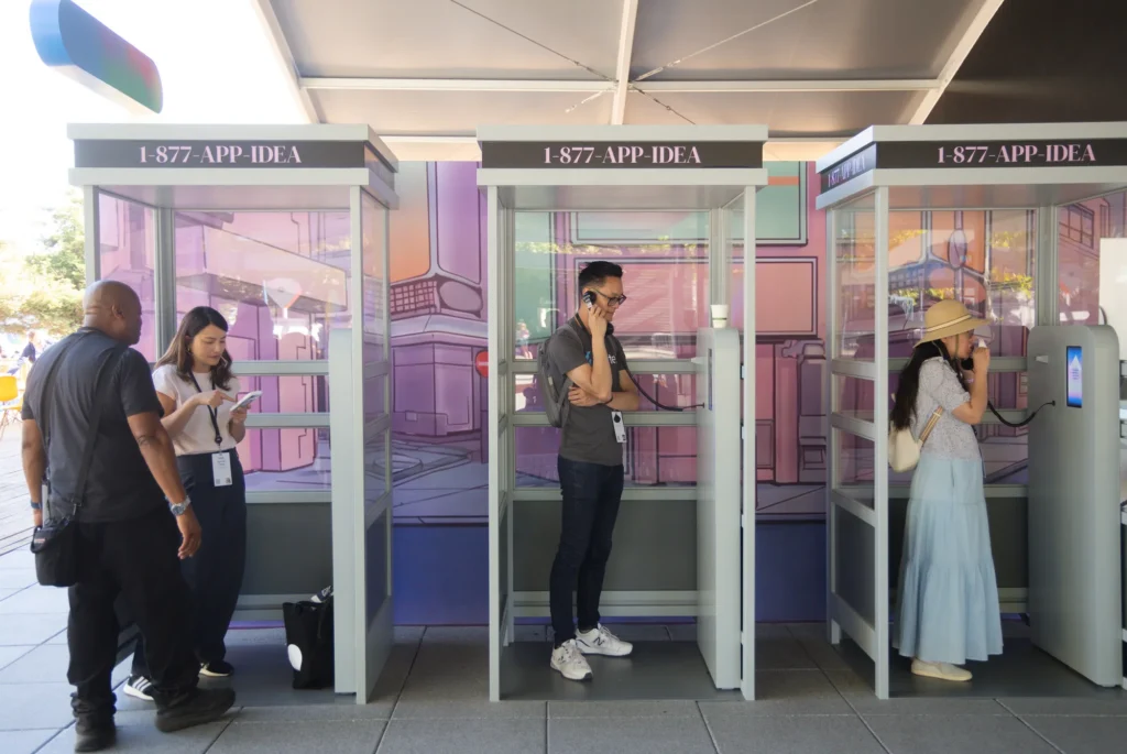 Attendees make calls from retro 1-877-APP-IDEA phone booths, an interactive activation