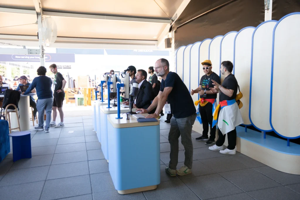 Developers test new products at hands-on demo stations staffed by brand ambassadors
