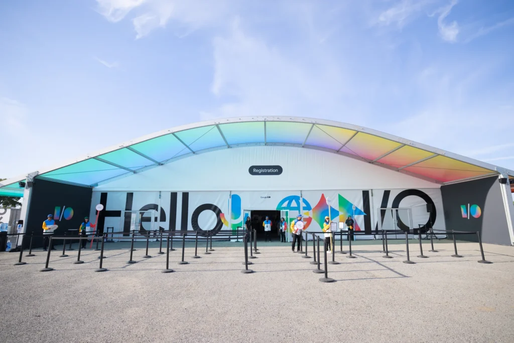 Rainbow-canopied Hello I/O registration structure at the entrance to Google I/O 2026