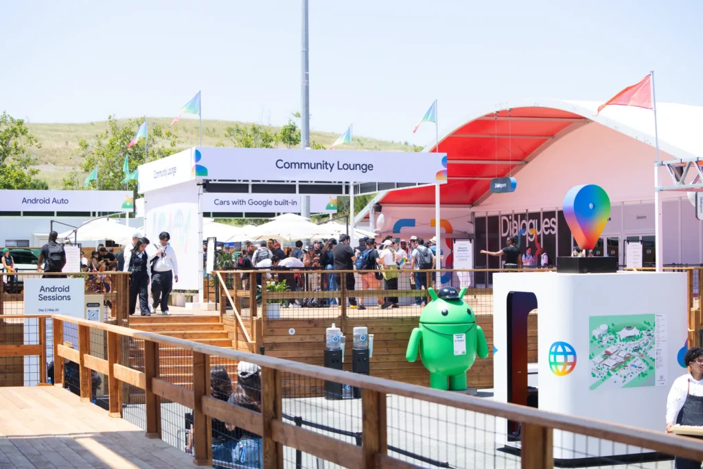 Community Lounge, Dialogues stage and Android village structures connected by wood decking