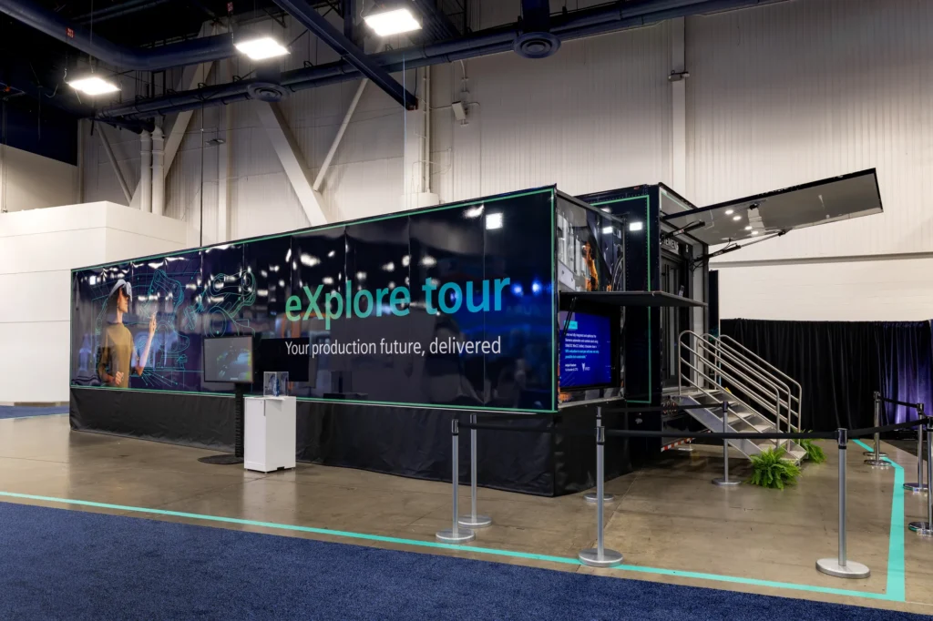 Siemens eXplore Tour mobile experience trailer, branded "Your production future, delivered," premiering at CES 2026.