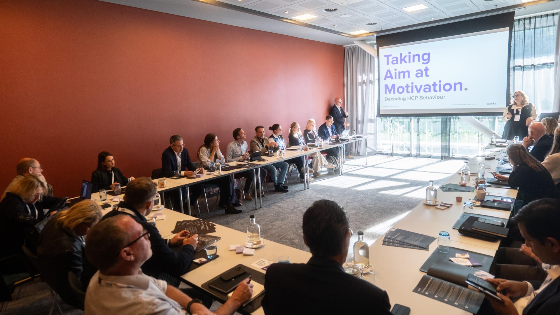 Sparks EMEA workshop opens with a Taking Aim at Motivation slide on HCP behaviour